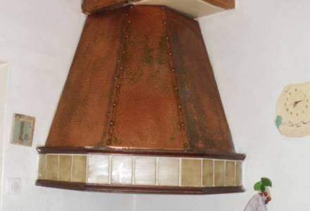 Réalisation d'une hotte d'angle en cuivre Nice